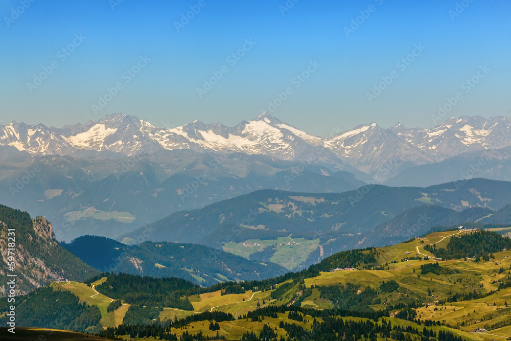 View of the Dolomites to the misty mountain range