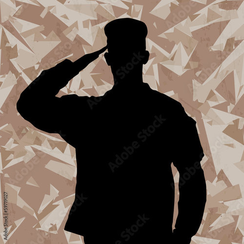 Saluting soldier's silhouette on a desert army camouflage backgr