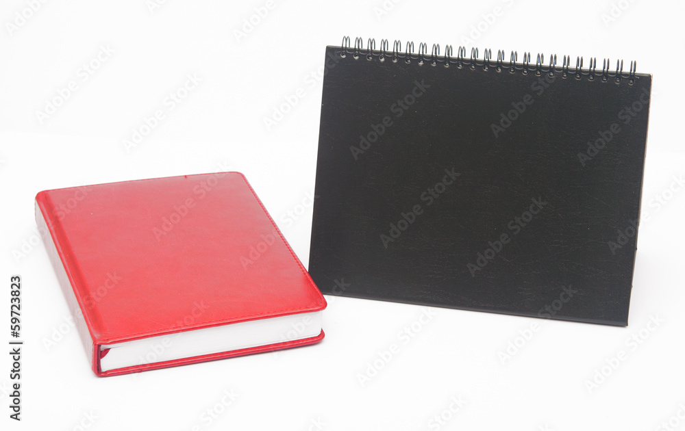 notebook and blank calendar on white background. notebook and blank calendar on white background.