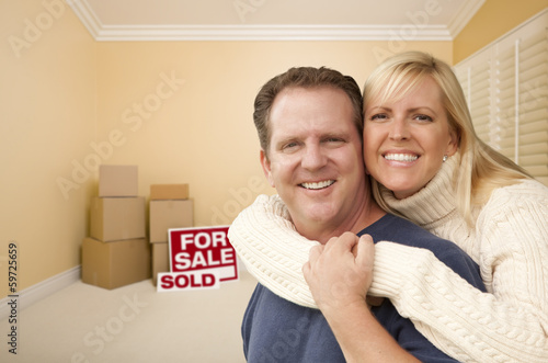 Couple in New House with Bo...