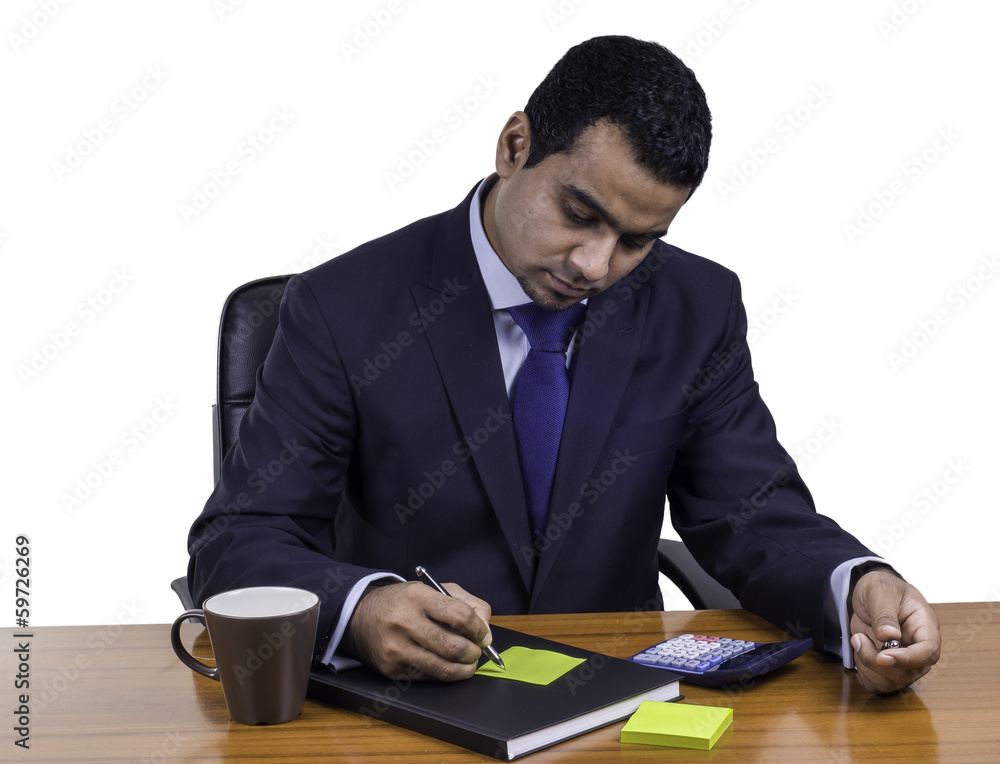 businessman writting a note businessman writting a note