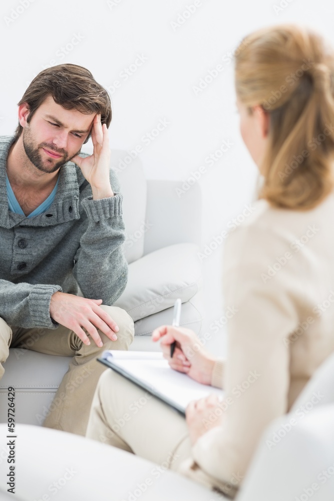 Man in meeting with a financial adviser Man in meeting with a financial adviser