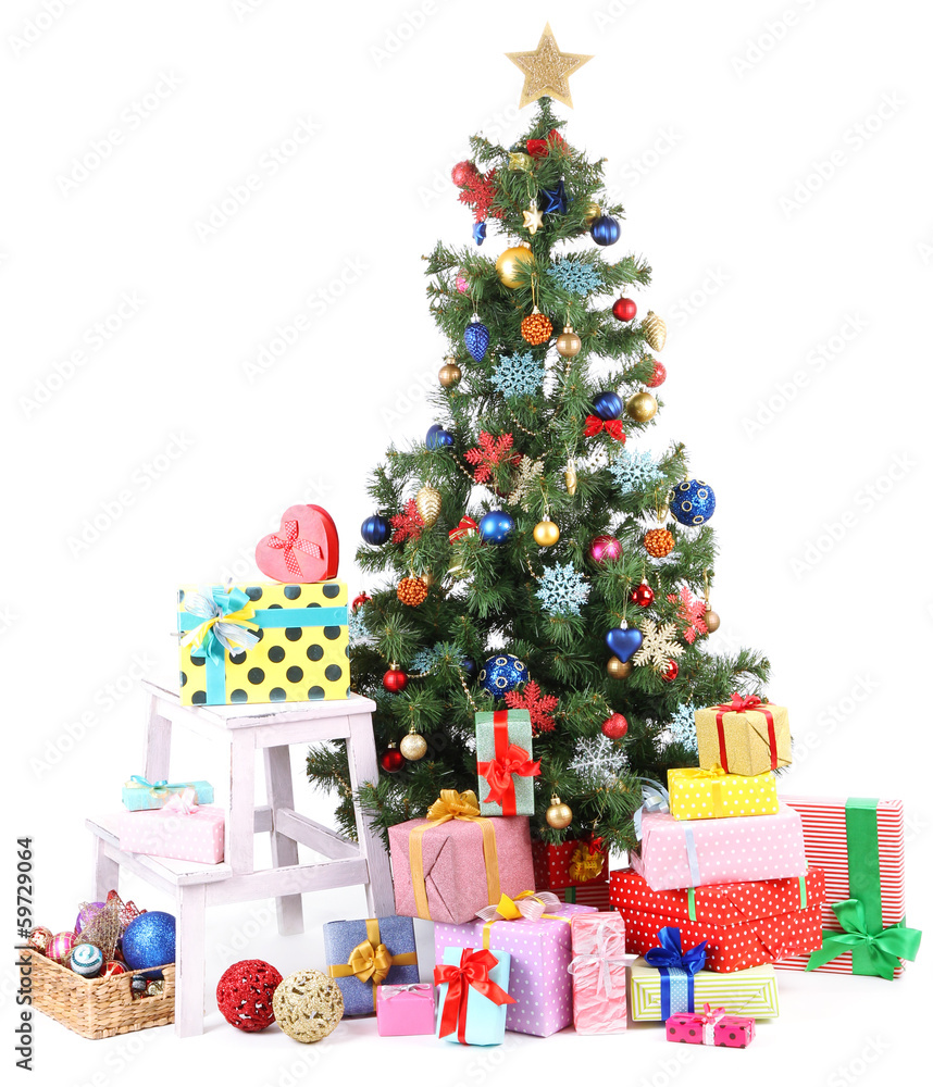 Decorated Christmas tree with gifts isolated on white Decorated Christmas tree with gifts isolated on white