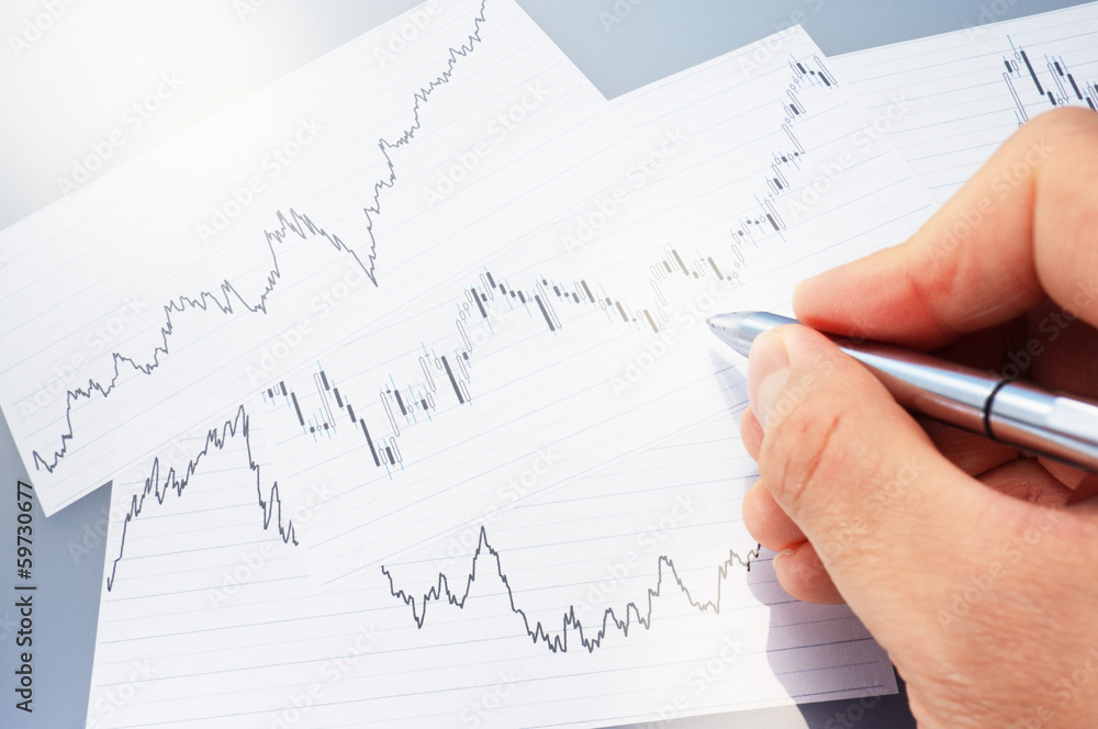 Charts and pen. Charts and pen.