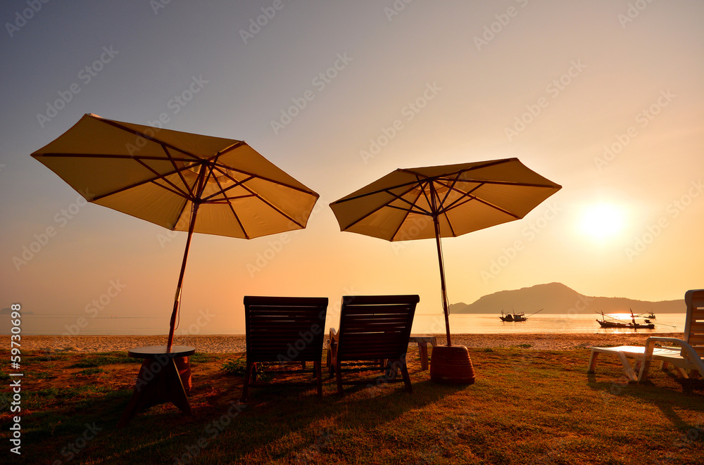 Relax Chair on Beach at Sunrise Relax Chair on Beach at Sunrise