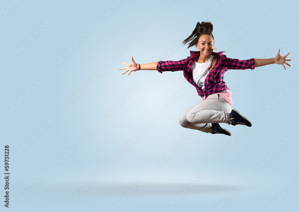 young female dancer jumping