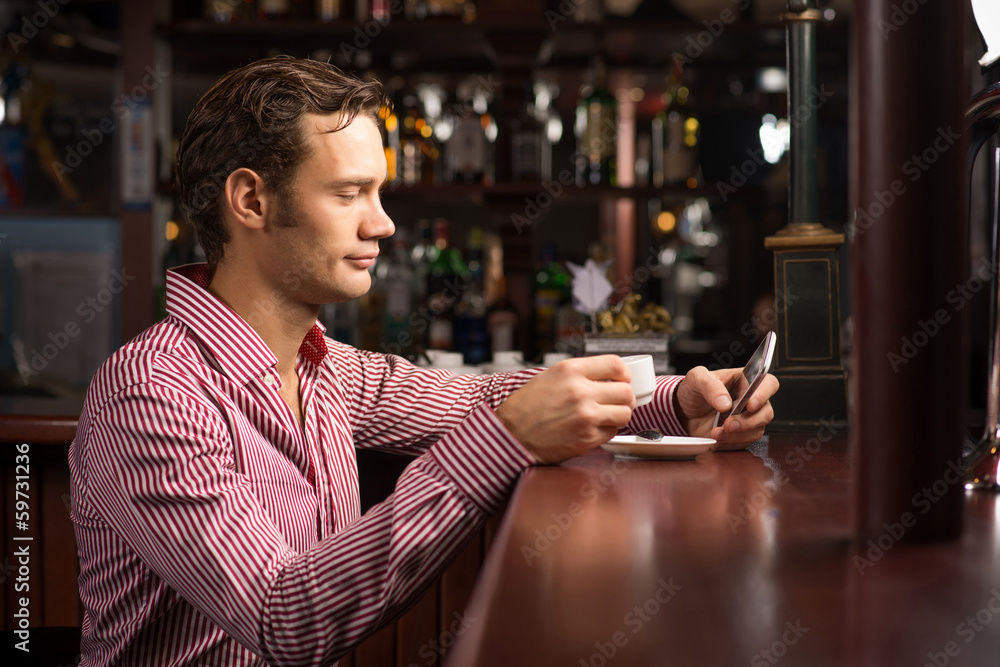 man with a cup of coffee man with a cup of coffee