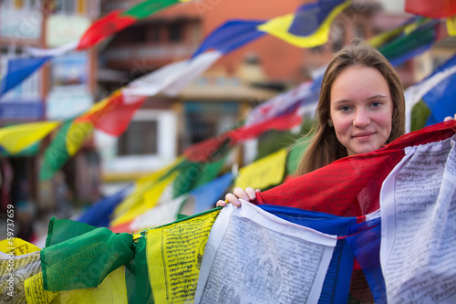 Teen-girl in Buddhist monastery.