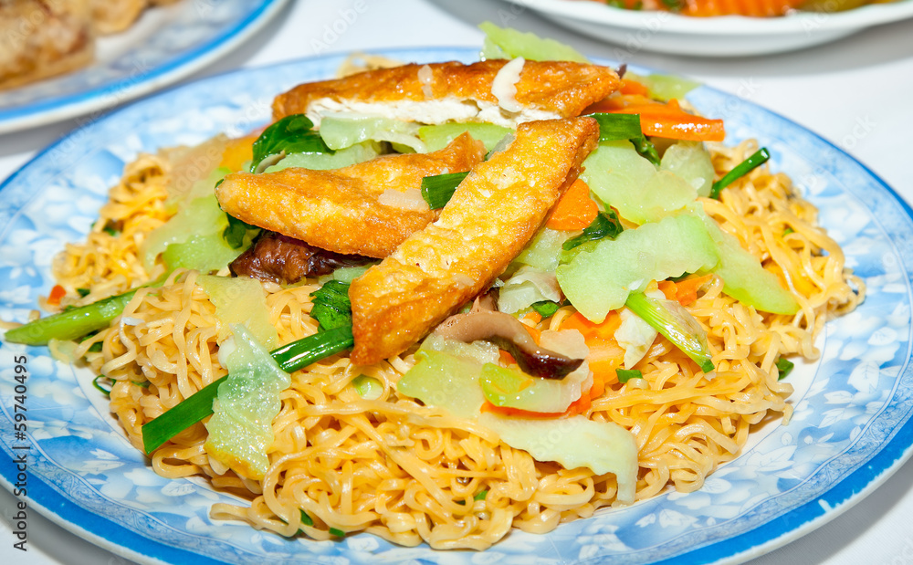 Vietnamese noodles with tofu,mushrooms and vegetables. Vietnamese noodles with tofu,mushrooms and vegetables.