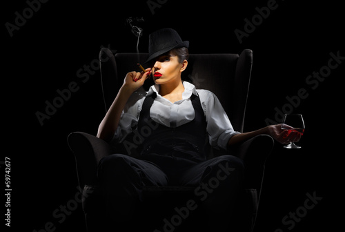 Mafiosi woman with cigar and brandy glass