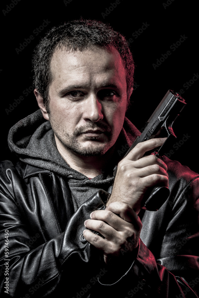 Housebreaker, thief, armed man with black leather jacket, danger Housebreaker, thief, armed man with black leather jacket, danger
