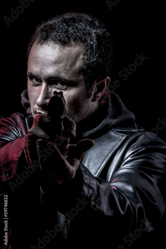 Security, thief, armed man with black leather jacket, dangerous © Fernando Cortés