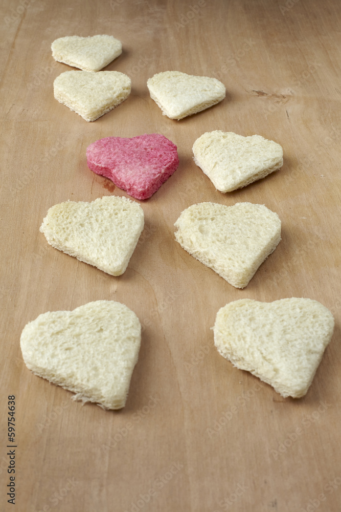 Red colored heart shape of bread Red colored heart shape of bread