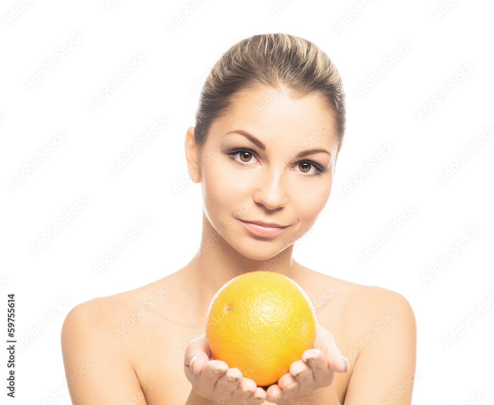 A beautiful girl holding an orange isolated on white A beautiful girl holding an orange isolated on white