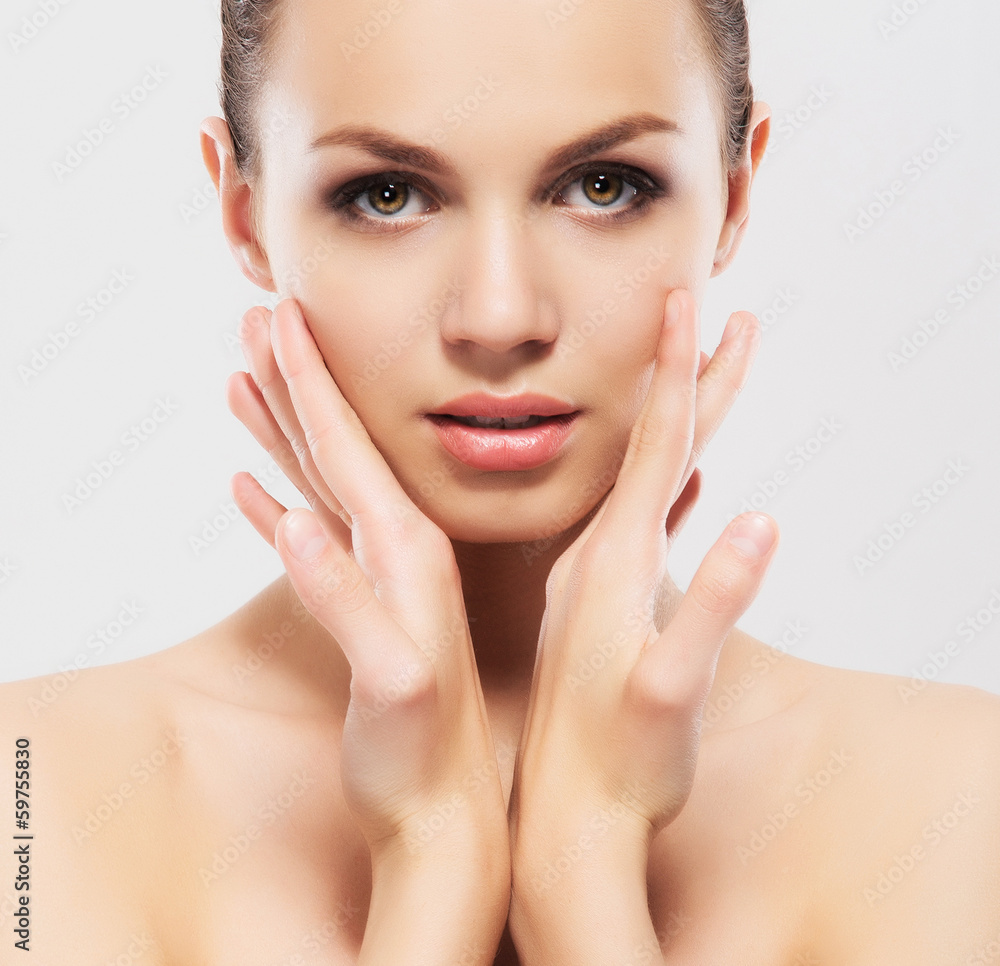 Spa portrait of a young and beautiful woman in makeup