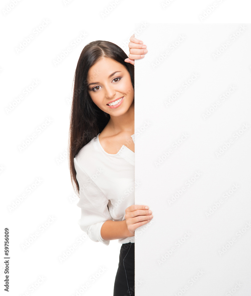 A young brunette businesswoman holding a blank white banner A young brunette businesswoman holding a blank white banner