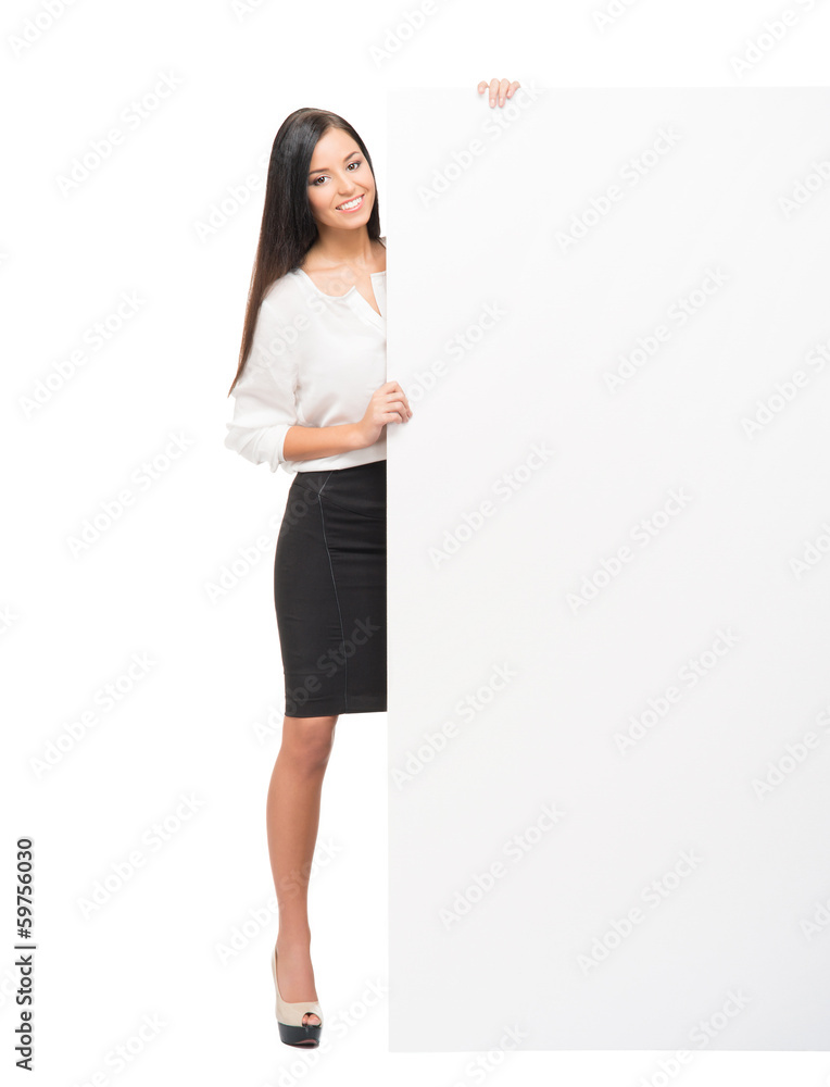 A successful and beautiful businesswoman with a large banner A successful and beautiful businesswoman with a large banner