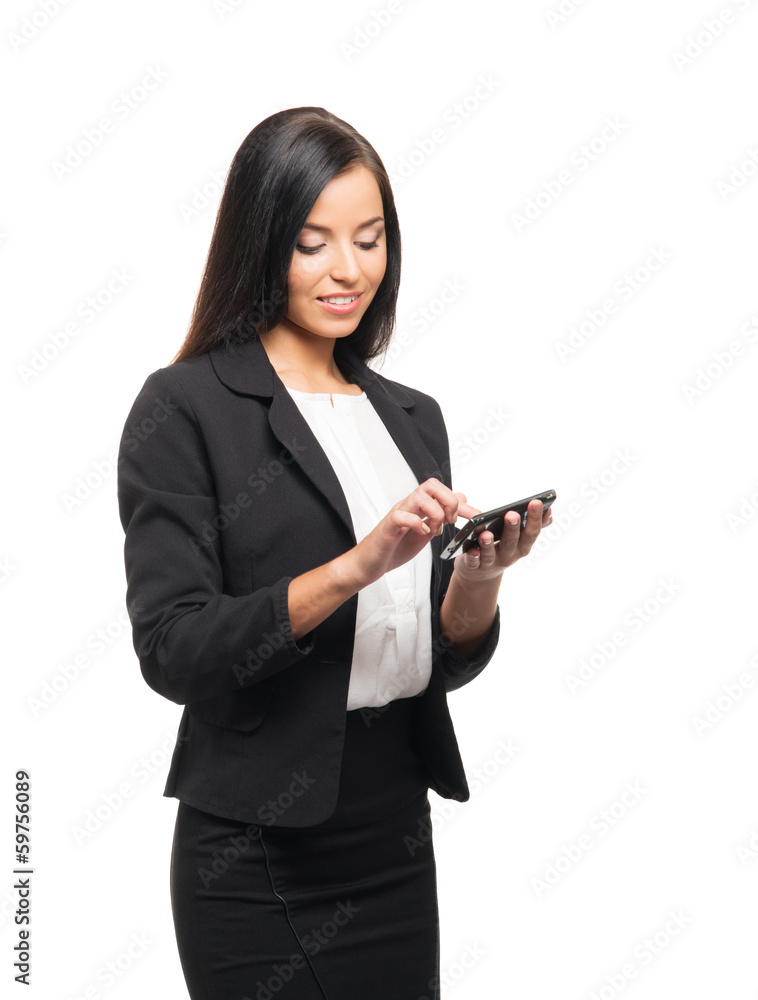 A successful and beautiful businesswoman with a mobile phone A successful and beautiful businesswoman with a mobile phone