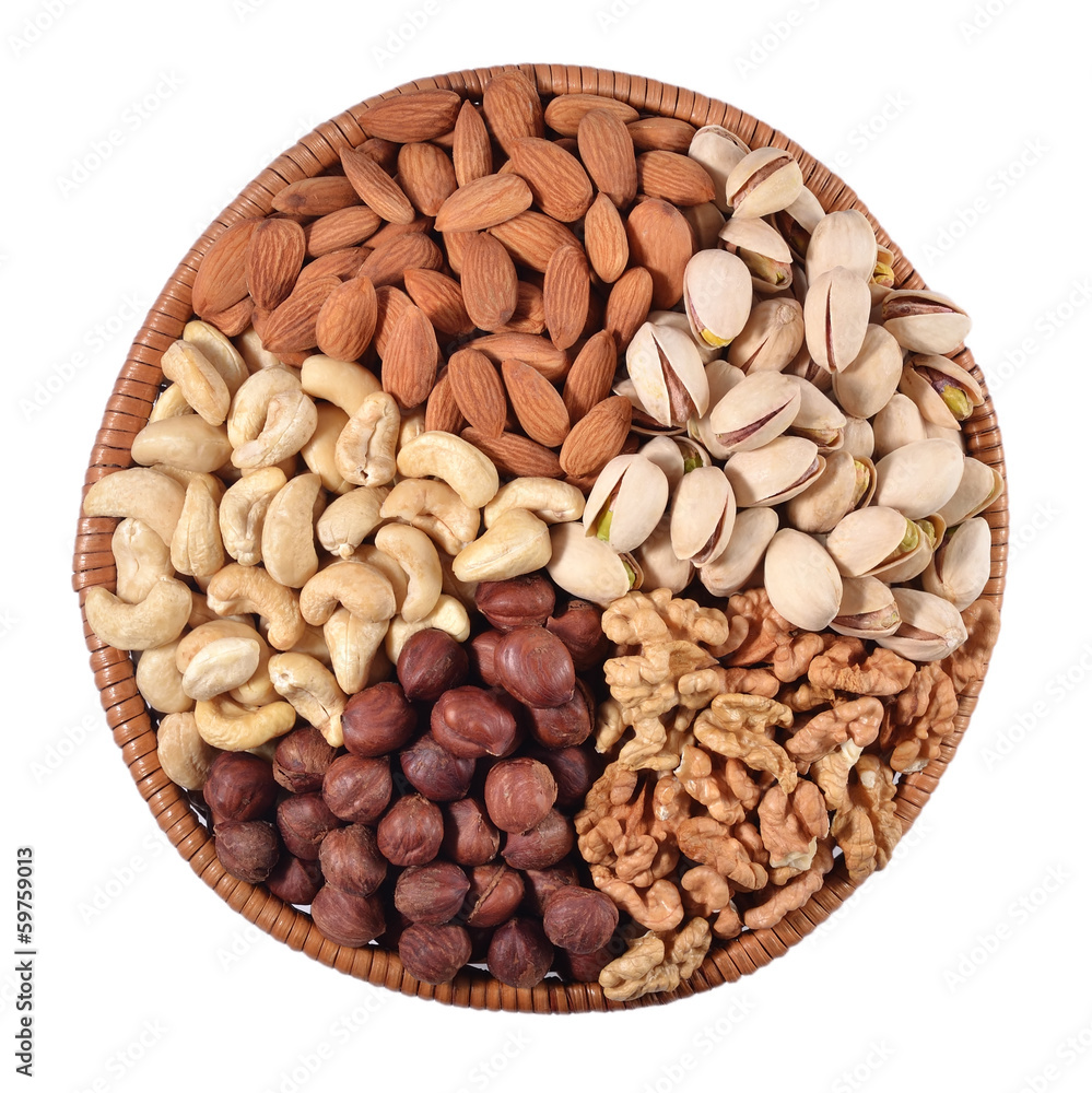 Assorted nuts in a wicker bowl Assorted nuts in a wicker bowl