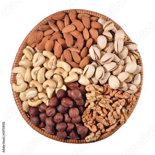 Assorted nuts in a wicker bowl
