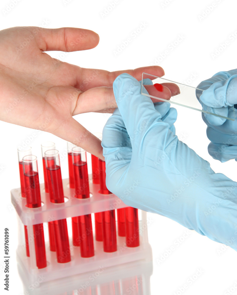 Test tubes with blood in hand isolated on white Test tubes with blood in hand isolated on white