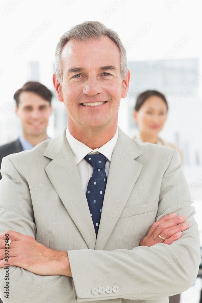 Mature businessman smiling at camera Mature businessman smiling at camera
