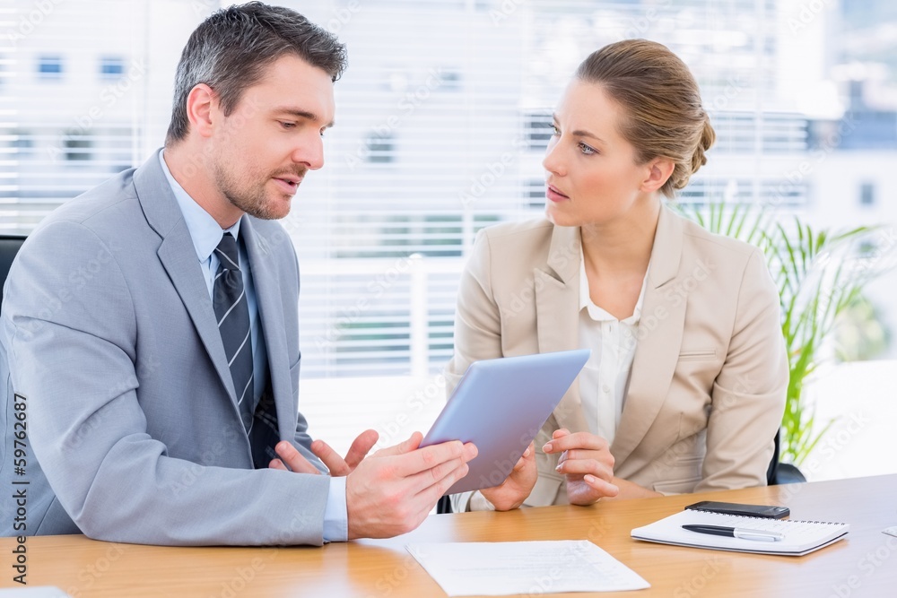 Smartly dressed colleagues in business meeting Smartly dressed colleagues in business meeting