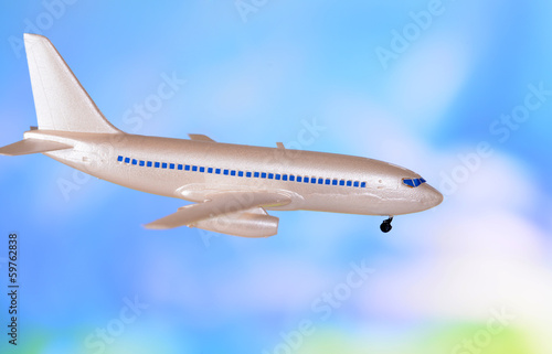Wallpaper Mural Plastic airplane on blue background Torontodigital.ca