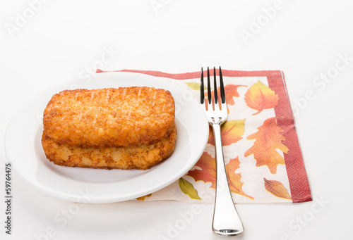 Delicious breakfast with fresh golden hash brown.