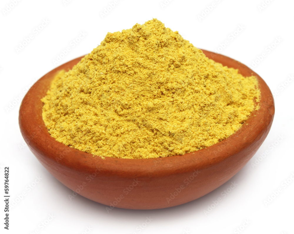 Ubtan powder on brown bowl Ubtan powder on brown bowl