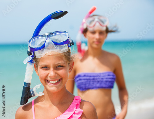 Hhappy girls on beach