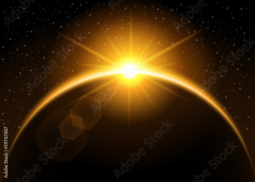 Rising sun behind the planet