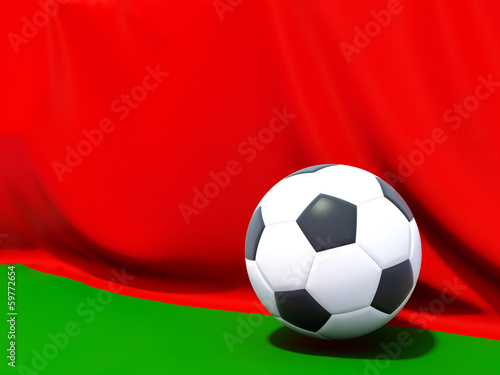 Flag of belarus with football in front of it