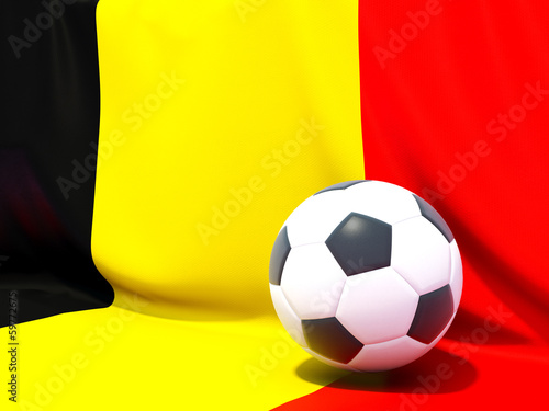 Flag of belgium with football in front of it