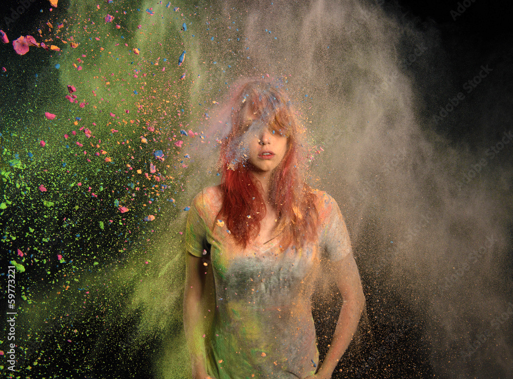 Girl with Colored Powder Exploding Around Her