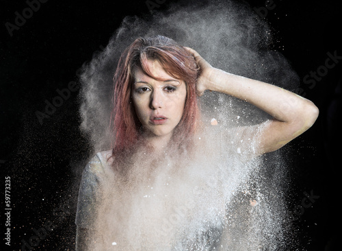 Girl with Colored Powder Exploding Around Her