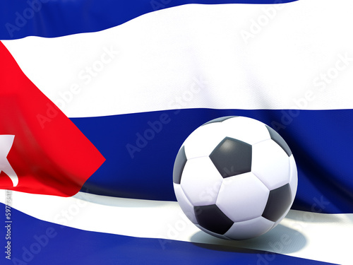 Flag of cuba with football in front of it
