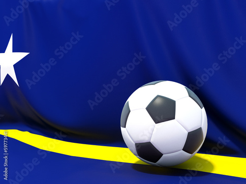 Flag of curacao with football in front of it