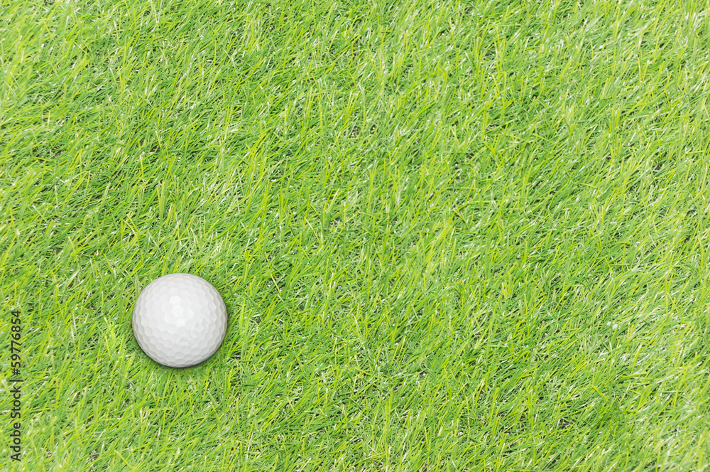 golf ball on green grass golf ball on green grass