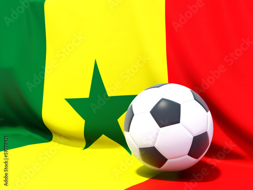 Flag of senegal with football in front of it