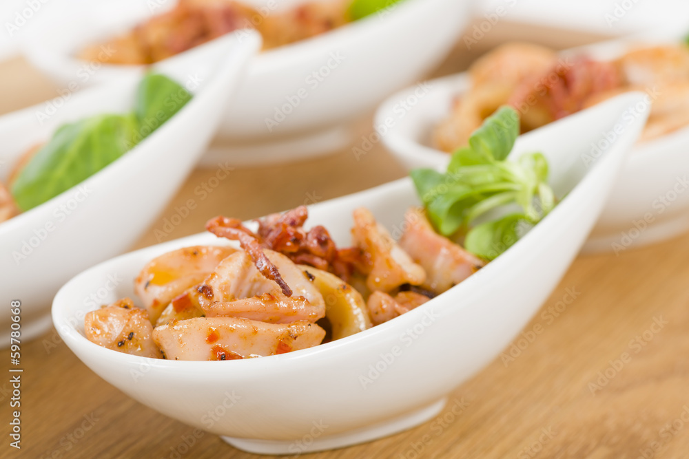 Fried Squid Rings - Pan fried squid rings with red pepper. Fried Squid Rings - Pan fried squid rings with red pepper.