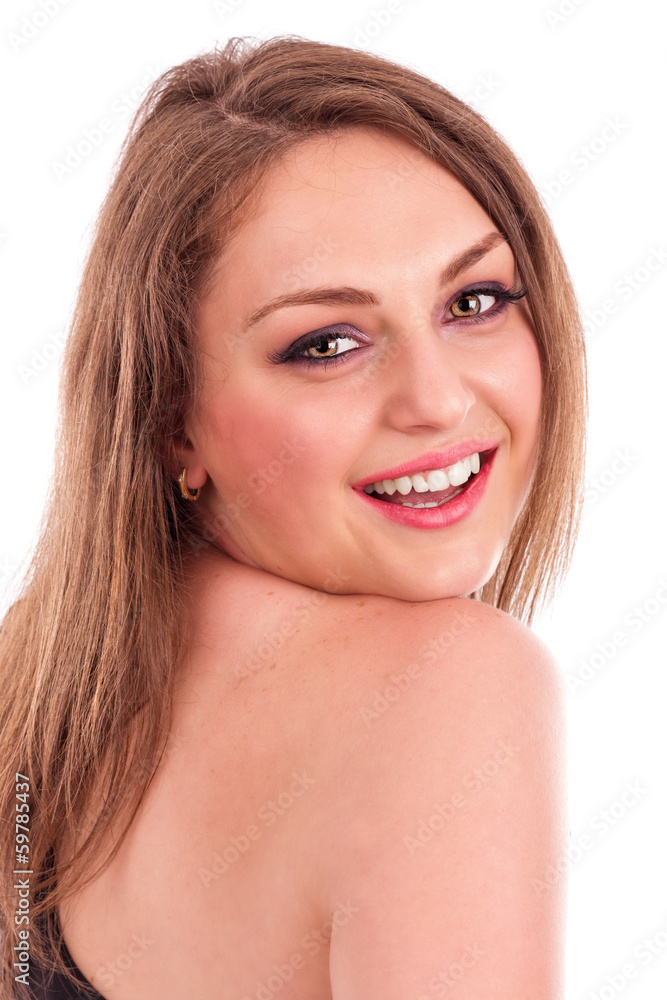 Portrait of a beautiful young woman looking back over her should Portrait of a beautiful young woman looking back over her should