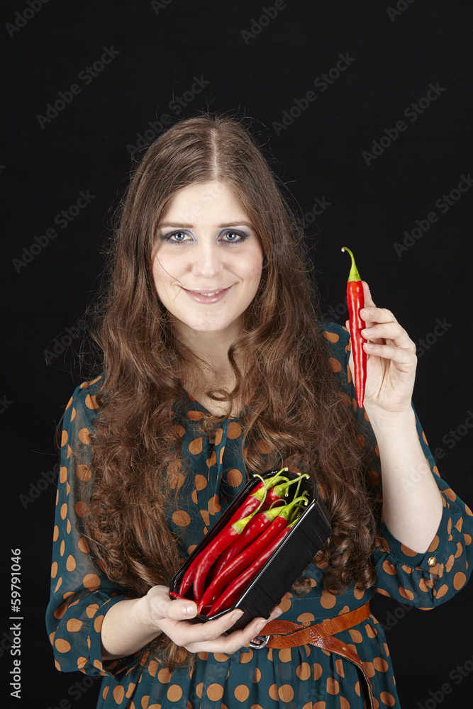 Obraz premium Frau mit Peperoni