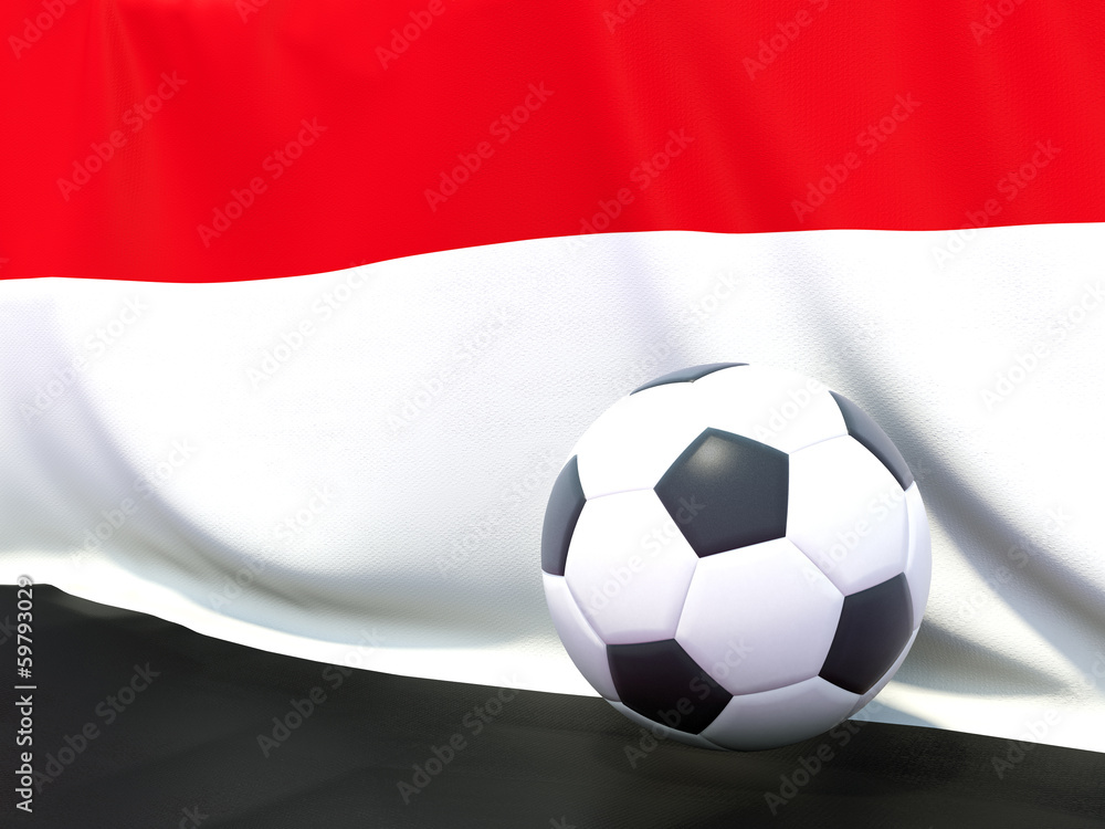 Naklejka premium Flag of yemen with football in front of it