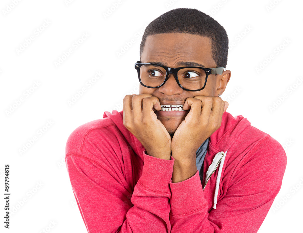 Stressed, shy, anxious, nerdy man biting his fingernails Stressed, shy, anxious, nerdy man biting his fingernails