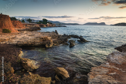 Sunrise over rocky coastline on Meditarranean Sea landscape in S