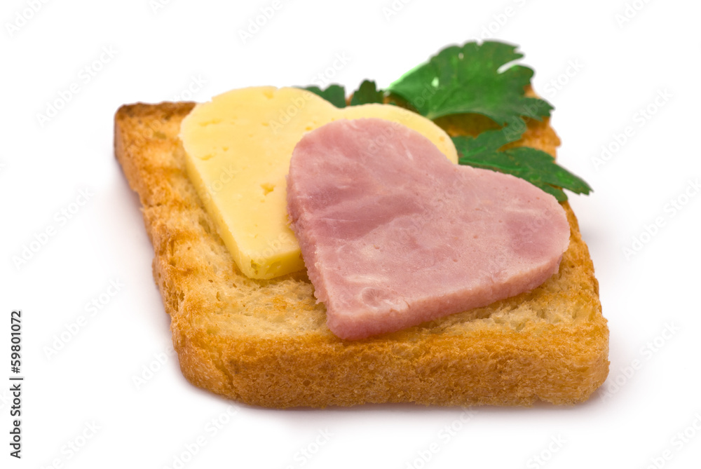 Toast with heart-shaped Ham and Cheese isolated on white Toast with heart-shaped Ham and Cheese isolated on white