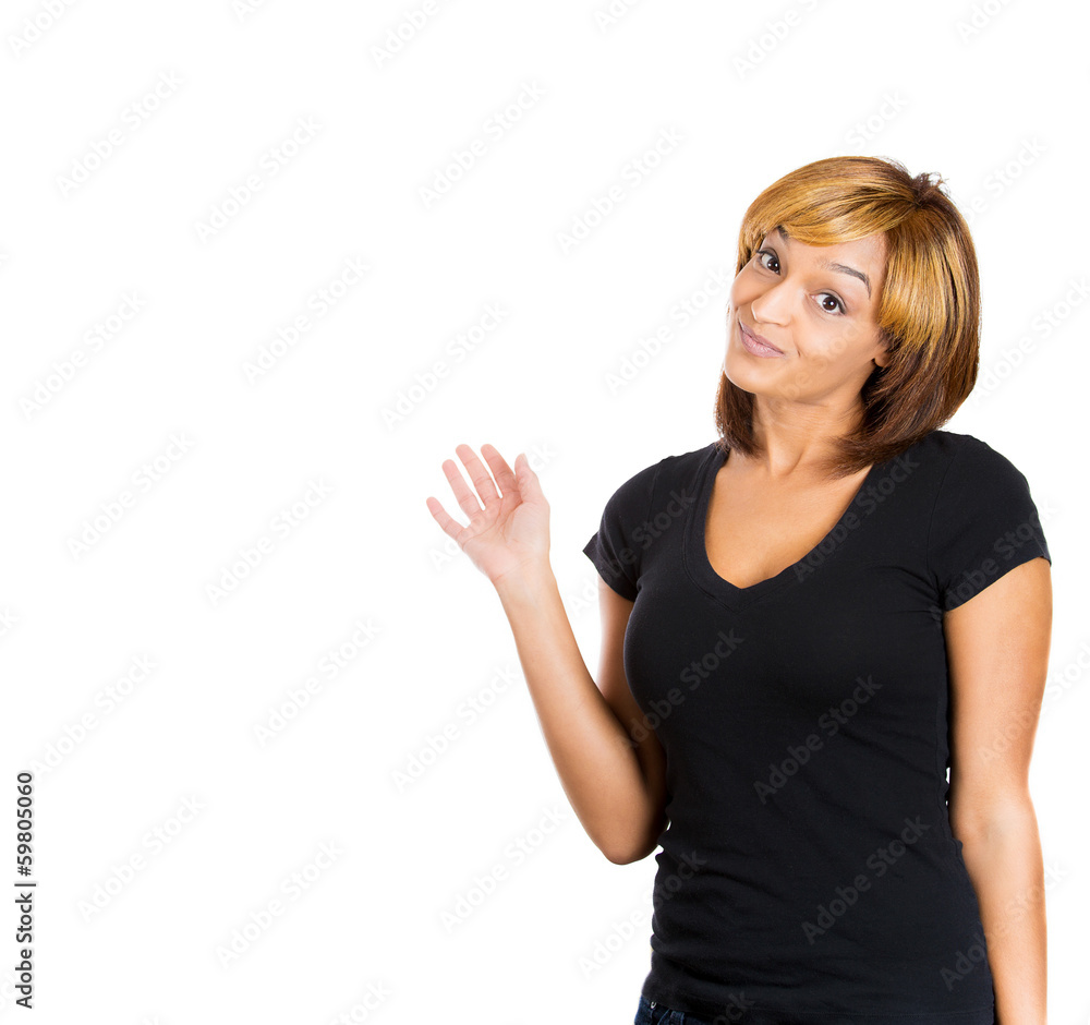 Portrait angry unhappy young woman shrugs shoulders Portrait angry unhappy young woman shrugs shoulders