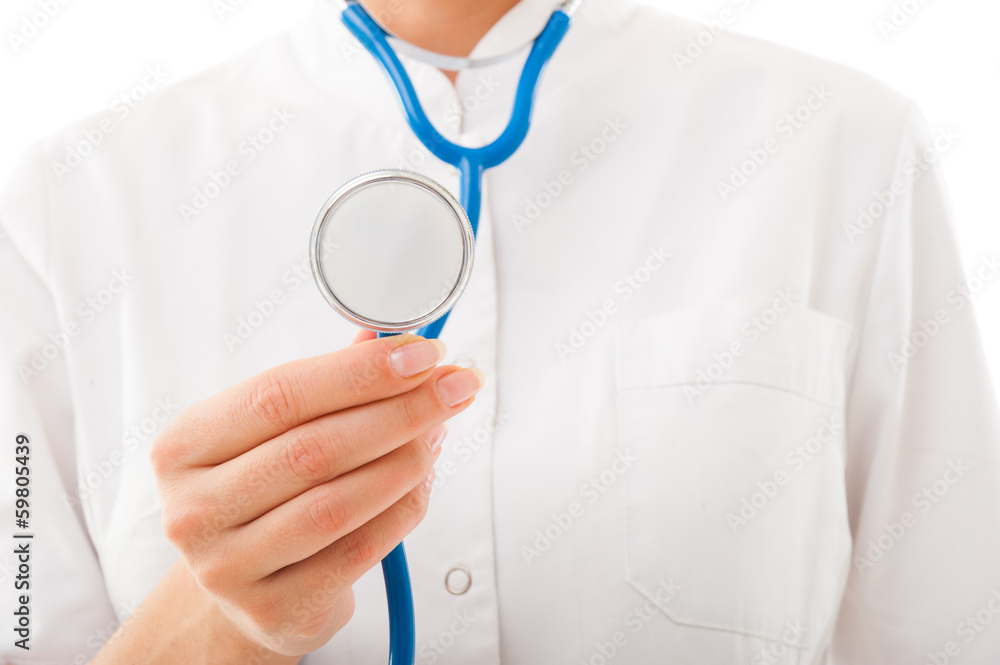 Closeup portrait of doctor holding stethoscope over white backgr Closeup portrait of doctor holding stethoscope over white backgr