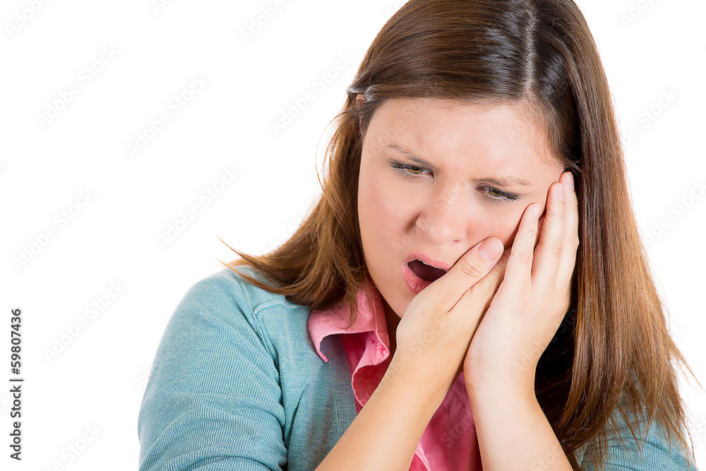 Young woman with headache and tooth ache Young woman with headache and tooth ache